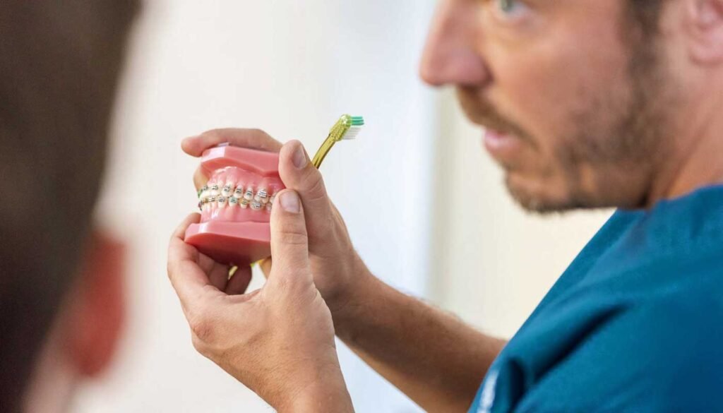 Orthodontic consultation about orthodontic applicances. Traditional braces expert Dr. Heinz in Portugal.